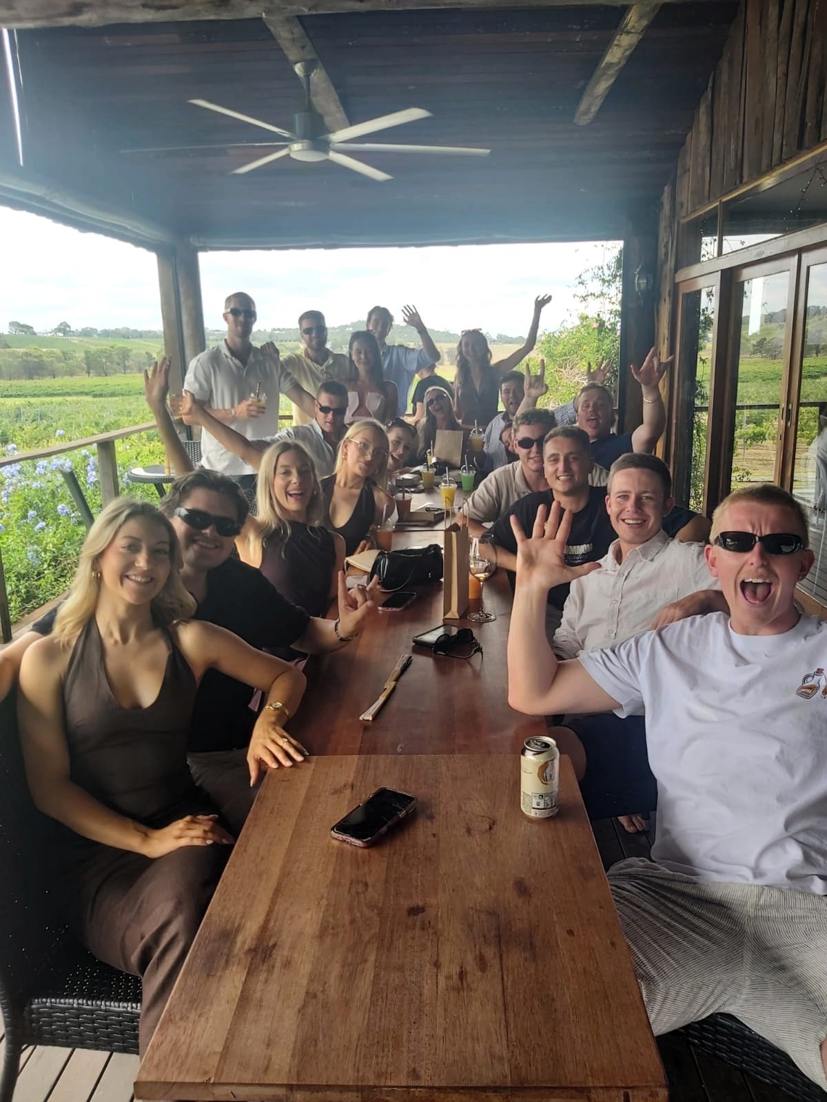 A group of friends celebrating with wine at a Hunter Valley cellar door